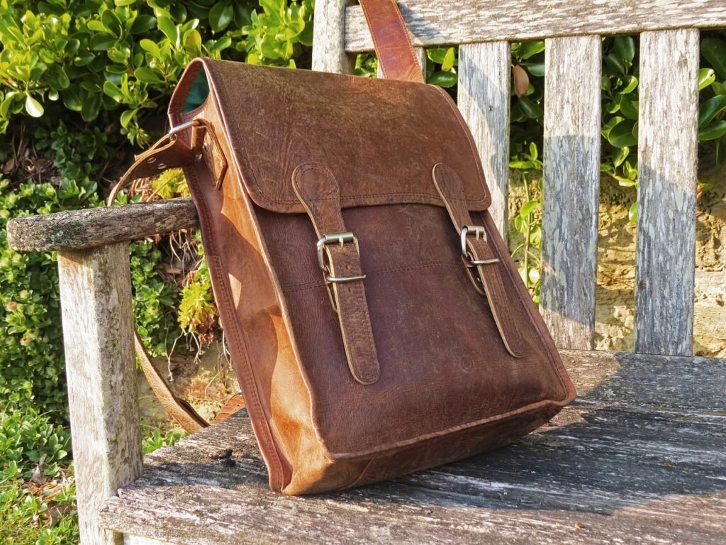 Satchel sitting on a park bench