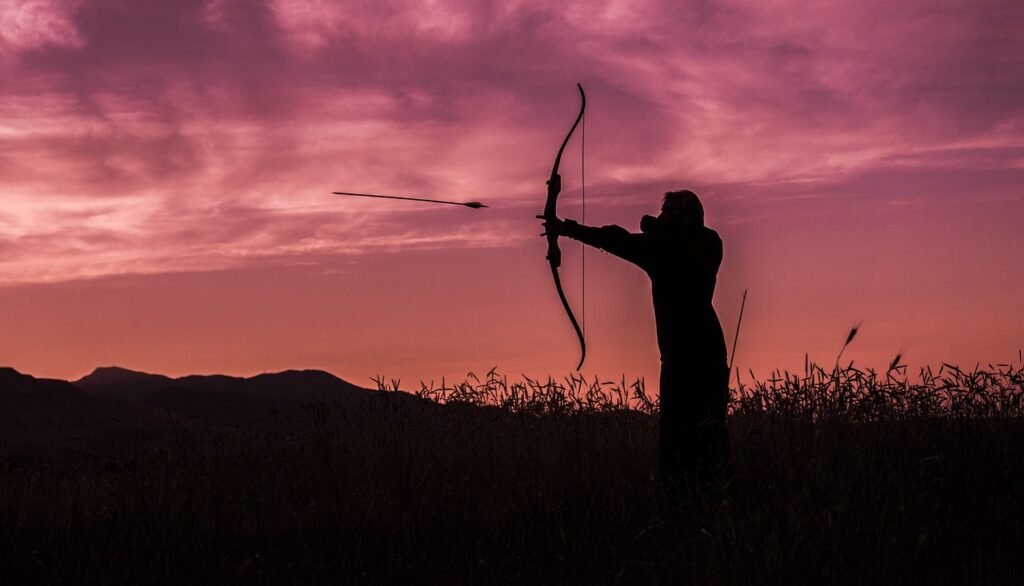 Archer shooting an arrow from a bow