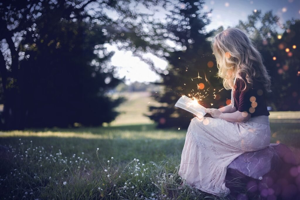 Girl reading from an open book