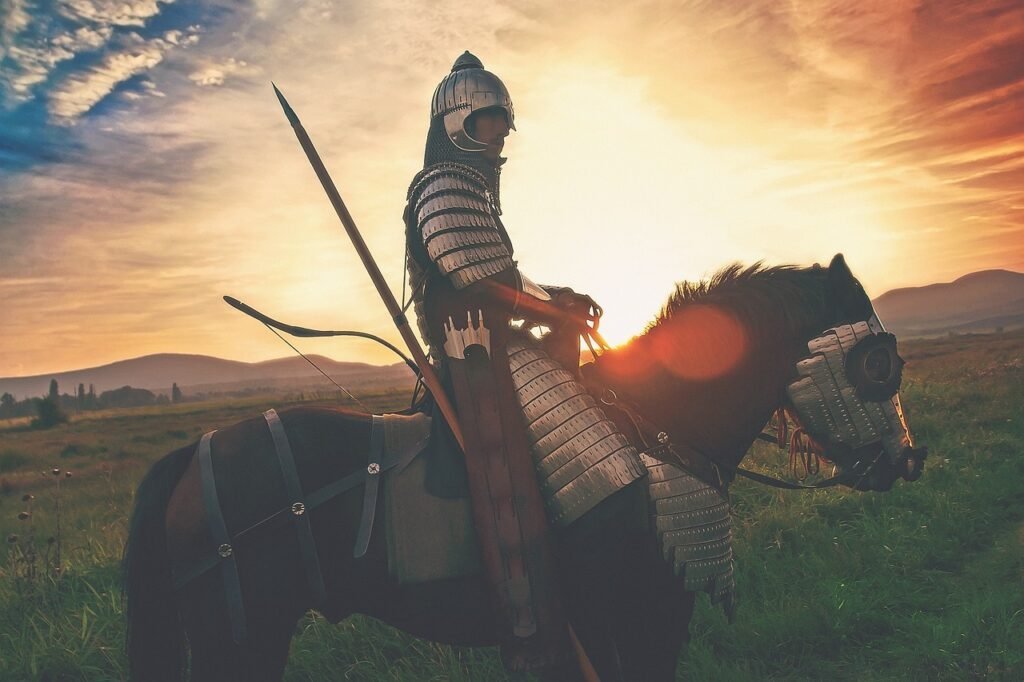 Knight riding a horse during sunrise