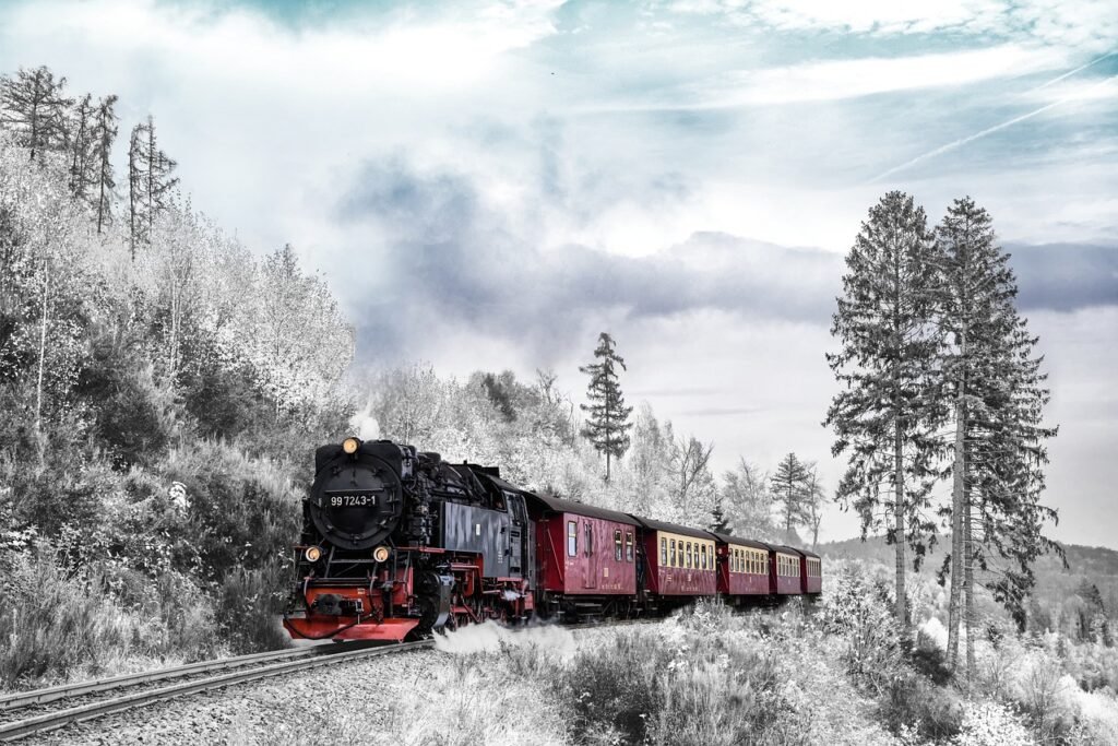 Train advancing through a wintry landscape